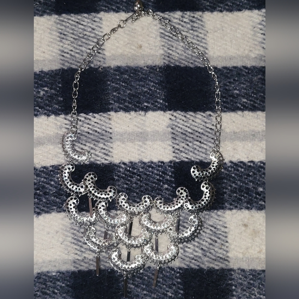 Vintage Sarah Coventry "Charisma" silver-tone metal bib necklace 1973